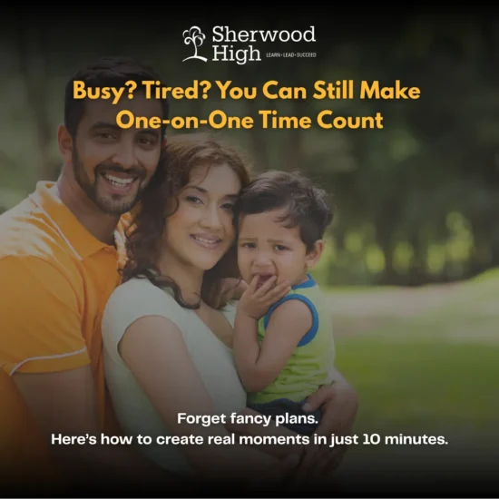 A smiling couple is holding their young child in an outdoor park-like setting. The child looks emotional while being comforted in the mother's arms. The father is standing beside them with a supportive expression